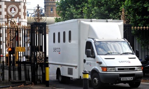 A Serco prison van leaving Wormwood Scrubs prison in west London