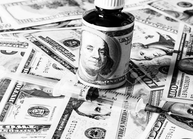 Bottle of drug or vitamin with dollars.