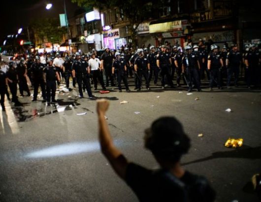 Protesters rally against the death in Minneapolis police custody of Floyd, in the Brooklyn borough of New York City