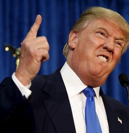 Republican presidential candidate Trump gestures and declares “You’re fired!” at a rally in Manchester