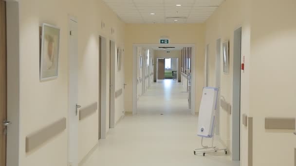 depositphotos_364448608-stock-video-long-bright-empty-corridor-in