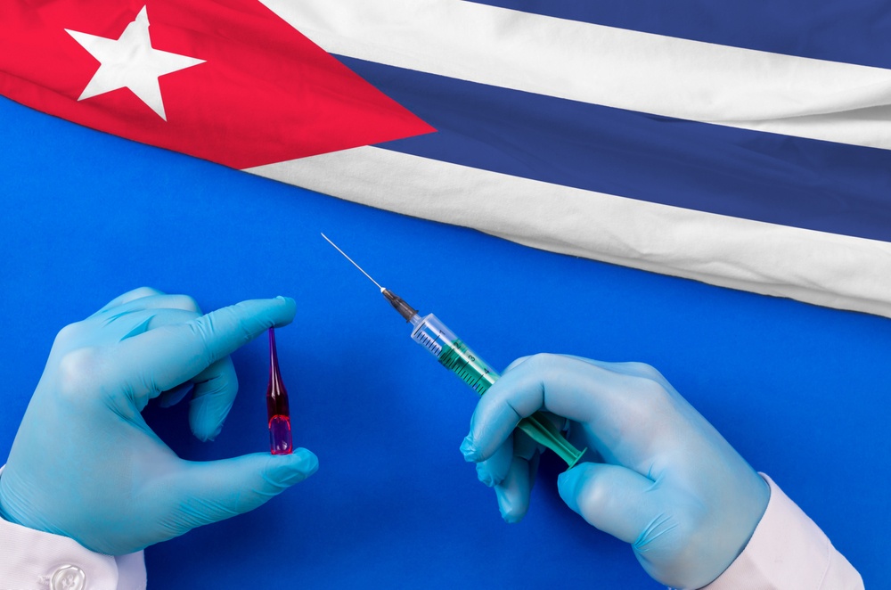 Cuba,Vaccination.,Hands,Of,Doctor,Holding,Syringe,And,Coronavirus,(covid-19)