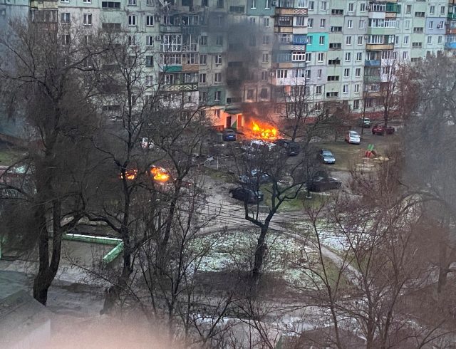 FILE PHOTO: Fire is seen in Mariupol at residential area after shelling