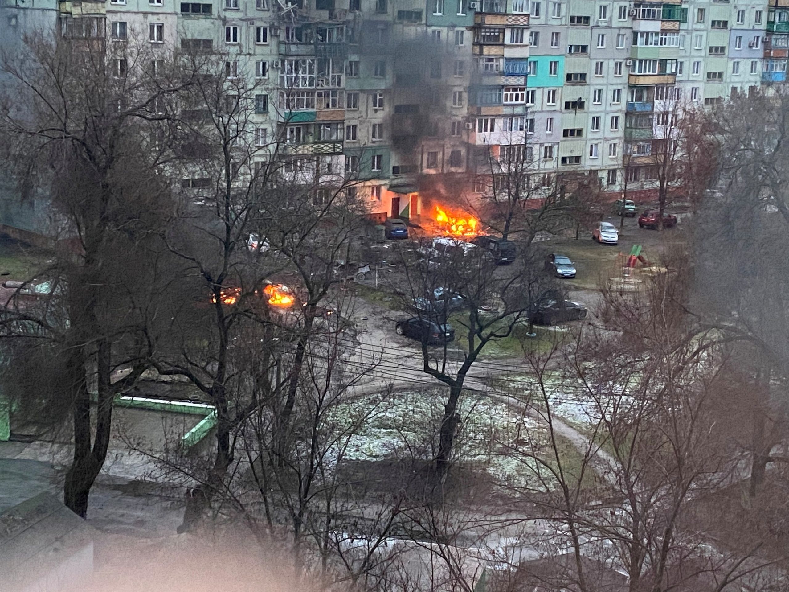 FILE PHOTO: Fire is seen in Mariupol at residential area after shelling