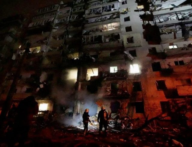 Damaged residential building, after Russia launched a massive military operation against Ukraine, in Kyiv