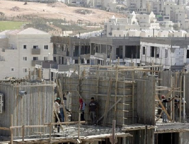 w13-194624newconstructionintheJewishsettlementofBeitarIlitsouthofJerusalemintheWestBankhouses45881721