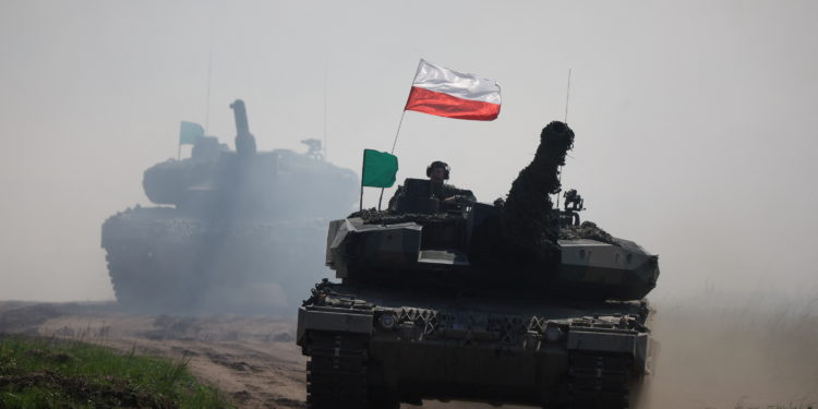Polish Leopard 2PL tanks ride during Defender Europe 2022 military exercise at the military range in Bemowo Piskie