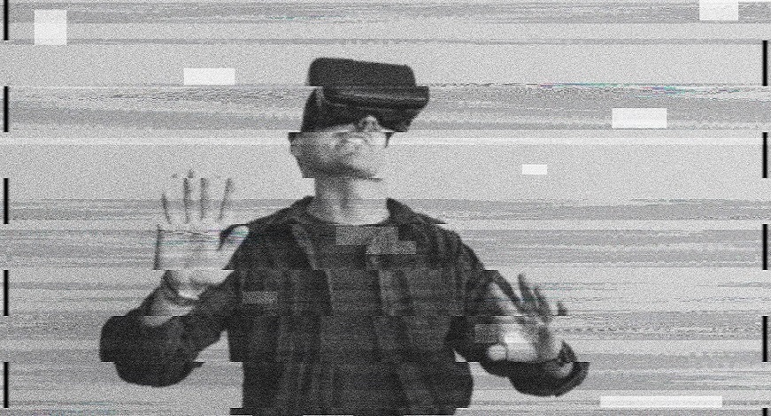man-using-vr-digital-glitch 871Χ460