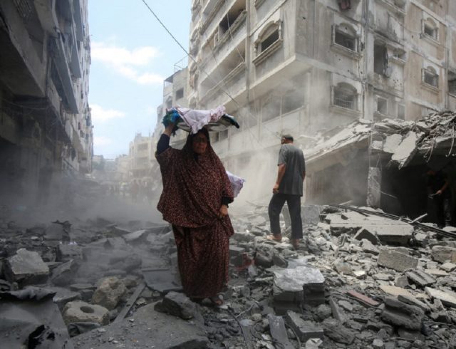 Aftermath of a morning Israeli strike on a house, in Gaza City