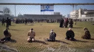 231227160542-04-palestinians-detained-idf-gaza-stadium-story-body-only