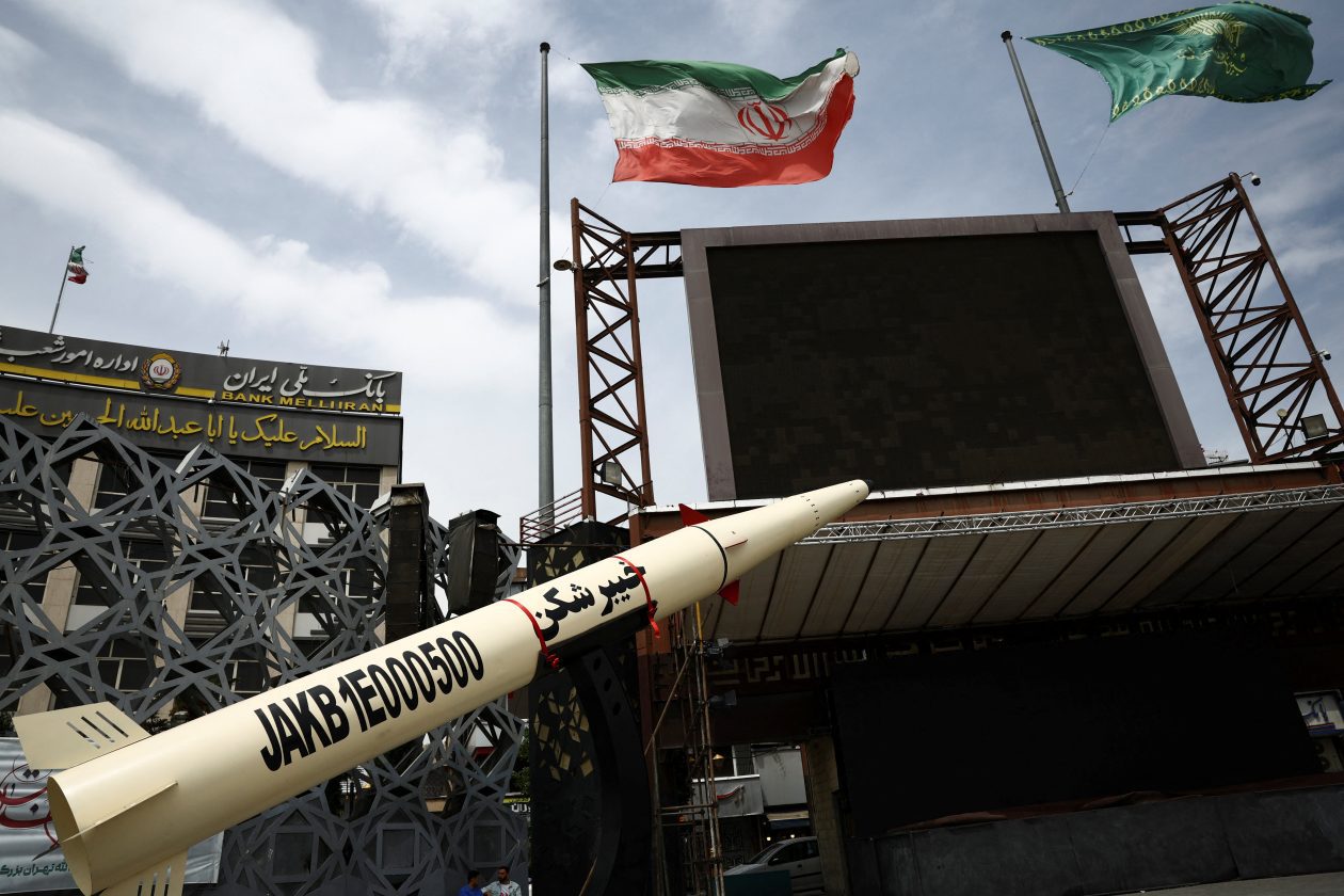 A symbolic mockup of an Iranian missile is displayed in Tehran