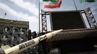 A symbolic mockup of an Iranian missile is displayed in Tehran