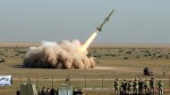 Iran’s Revolutionary Guards carry a missile test out