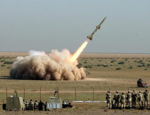 Iran’s Revolutionary Guards carry a missile test out