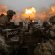 Ukrainian servicemen fire an anti-aircraft gun towards Russian positions on a frontline near the town of Bakhmut